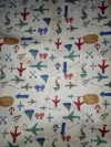 White cotton and linen printed with green fish details Picture